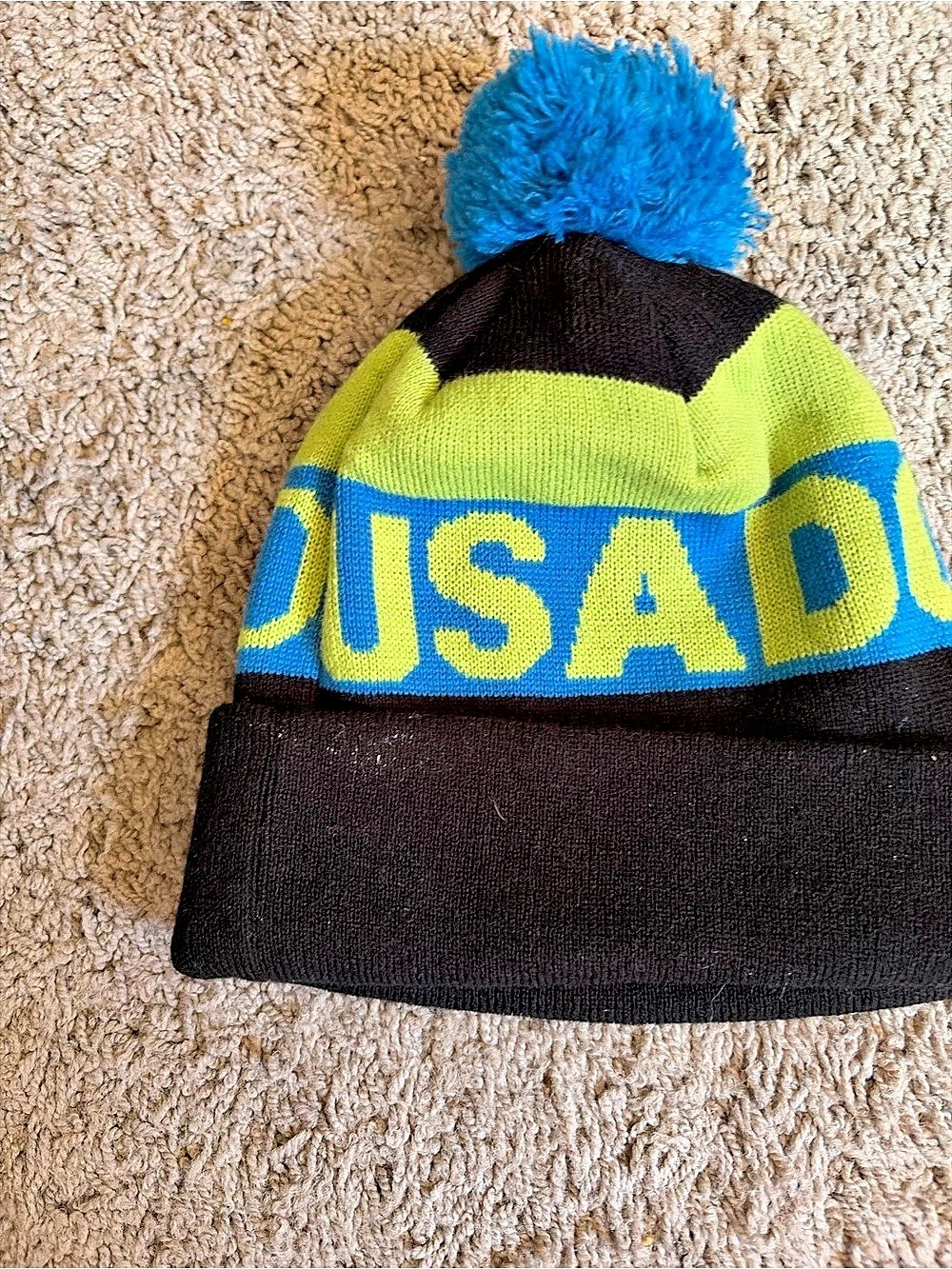DC Color Block Pom Beanie in Black & Green